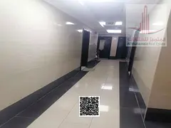 A residential/commercial building in Al Nuaimiya 1. It features a basement, ground floor, and 10 add