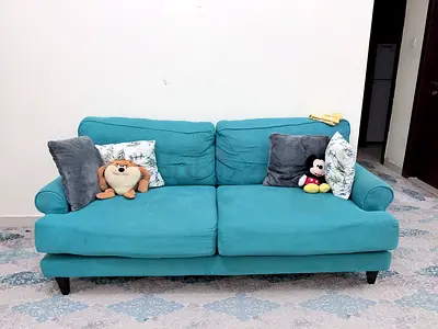 Comfortable 2.5-Seater Teal Sofa in Good Condition