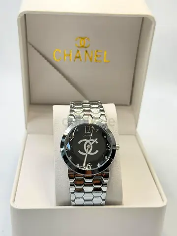 Chanel women's wristwatch with box — silver-tone bracelet, black dial