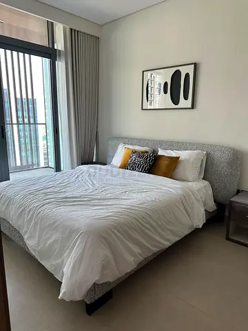 Modern upholstered queen bed with headboard — light grey