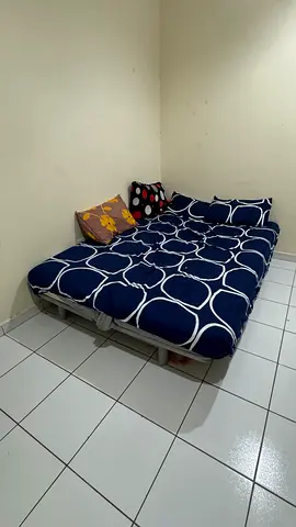 Used low steel bed frame with mattress and bedding - simple double setup