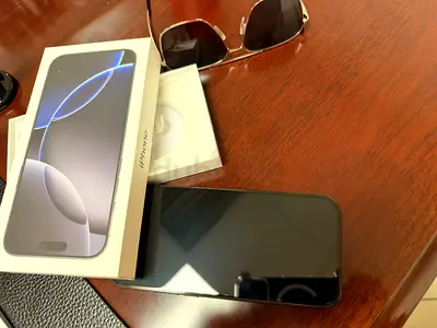 iPhone 16 Pro Max with original box — excellent condition