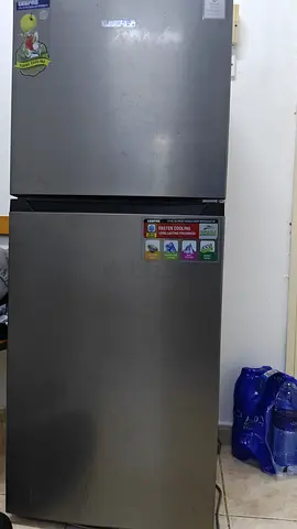 Silver double-door refrigerator in working condition, 2-door top freezer