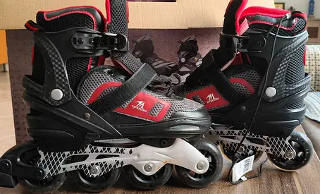 Men's adjustable inline roller skates size M — lightly used