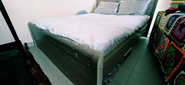 Queen size wooden bed frame - gently used No mattress included