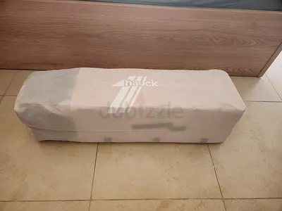 Travel cot with mattress