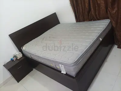 King bed frame with mattress and bedside drawer - dark wood