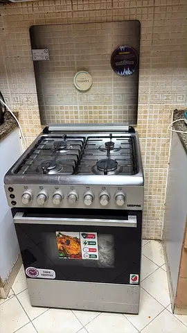 Geepas Stainless Steel 4-Burner Gas Cooker with Oven — Good Working Condition