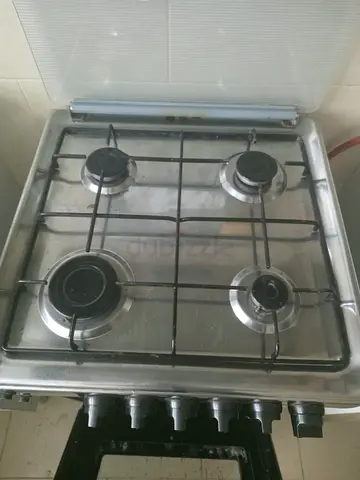 Used 4-Burner Stainless Steel Gas Stove with Oven