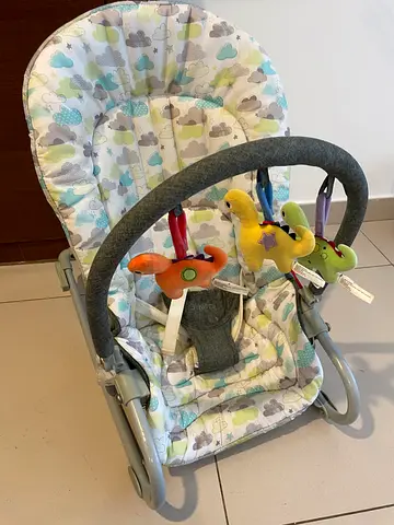Baby bouncer seat with toy bar - gently used