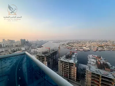 100-character listing 2BR apartment for rent in Al Waha Towers, Ajman: sea view, 2 balconies, gym, pool & private parking.