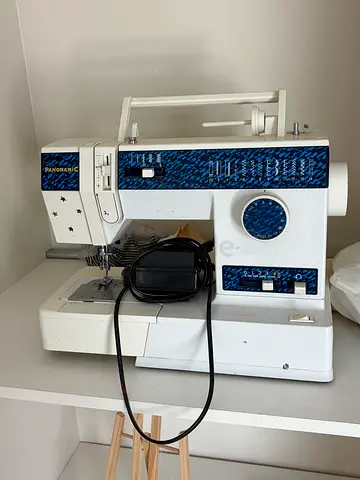 sewing machine in working condition