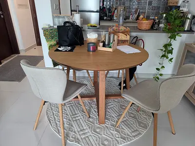 Round Wooden Dining Table with 4 Upholstered Chairs and Rug - Good Condition