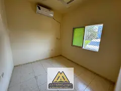 2BR in Al Rawda 2, ground floor, 2 baths, split AC, AED 24,007 yearly, 4 payments.