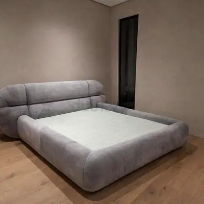 Modern low-profile upholstered double bed — light grey