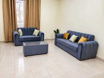 5 seater sofa grey color with mix color pillowss and table brand new 3+2 we are selling at affordabl