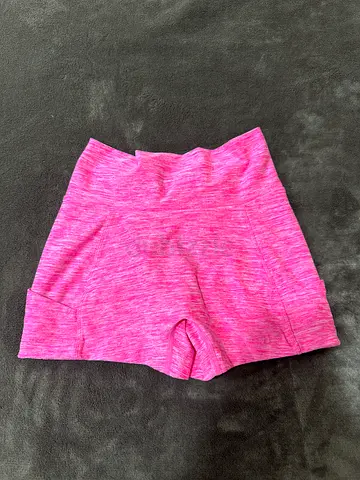 Fit Squad Pink women's athletic shorts - size small, lightly used, ruched back