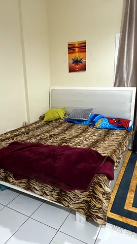 White faux-leather double bed with headboard - good condition