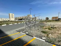 Residential-commercial land for sale in the Al Yasmeen area of ​​Ajman. The plot covers an area 