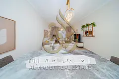 Two-Bedroom Apartment with Living Area – Hotel-Style Furnishings & Distinctive View