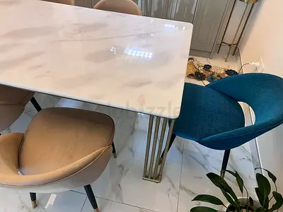 Marble-top dining table with mixed modern chairs (6-seater)