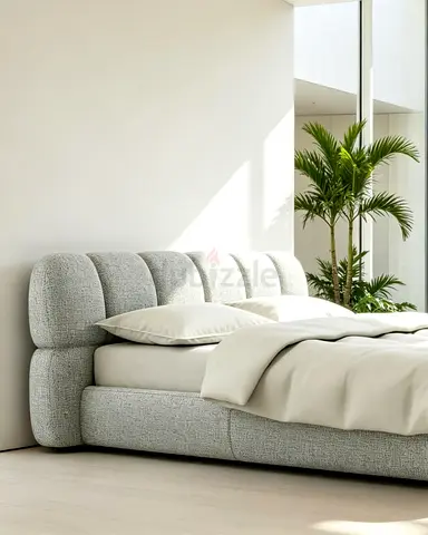 Light grey upholstered platform bed with padded headboard (Queen)
