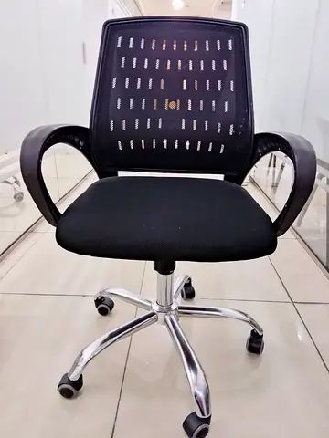 4 - Black Mesh Office Chair with Armrests and Wheels - Good Condition