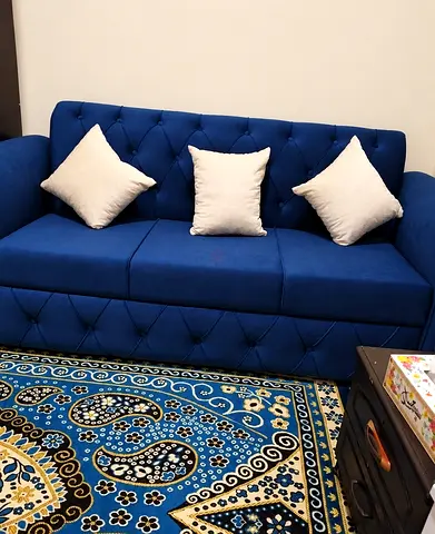 3 seater sofa with beige color pillows available you can get from us