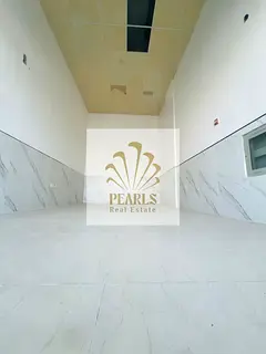 A commercial shop for rent in Al Rawda 2, Ajman, located on a main road and close to Sheikh Ammar St