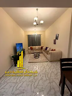 Luxury apartment—second occupancy—featuring a bedroom, living room, and open balcony. Located in