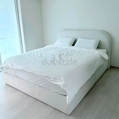 Minimalist upholstered double bed with cushioned headboard - cream