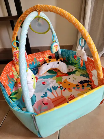 Baby activity play gym with hanging toys - gently used