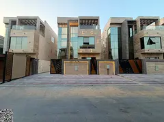 For sale: A two-story villa with a roof terrace, located on Sheikh Mohammed Bin Zayed Road. The pric
