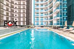 Own a stunning 3-bedroom apartment in Al Waha Towers, rented for AED 9,000/month, furnished, with gy