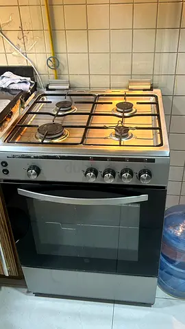 Stainless Steel 4-Burner Gas Cooker with Oven - Good Working Condition
