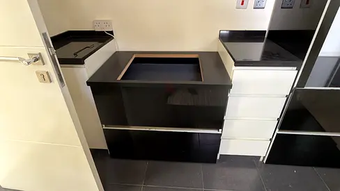 Black glossy stove unit with storage - good condition