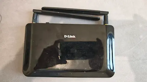 DLink Model - DWR - 921 - Used wireless router with 4 Ethernet ports and DC power