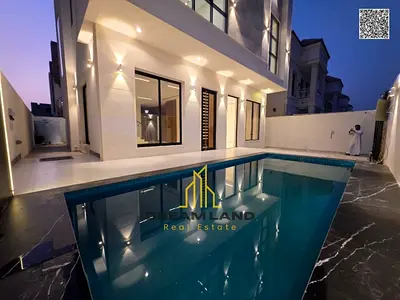 Ready-to-move-in 5-bedroom villa with a swimming pool, located on the main road in one of Ajman’s m