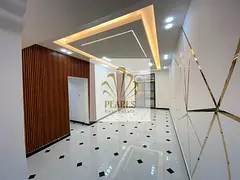 A luxurious 2-bedroom apartment with a living room is available for annual rent in Al Rawda 3, Ajman