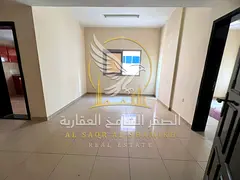 Spacious one-bedroom apartment with a living room for rent in Al Butina, Sharjah. Features include c