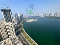 Spacious 3BR with Sea View in Al Majaz 3, featuring a master maid's room, free parking, and flexible