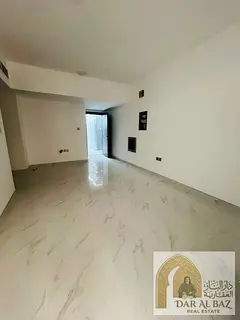 A one-bedroom apartment with a living room is available for annual rent in Muwaihat 3. It features a