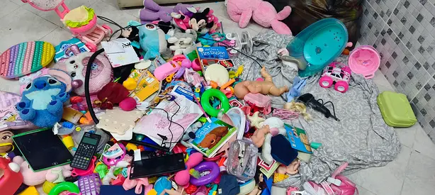 Many toys and games all collect together