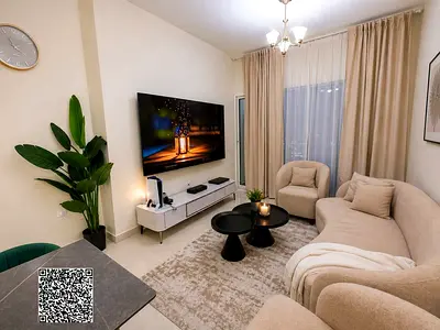 Cheapest two-bedroom apartment with a living room for sale in Golf Tower, Ajman.