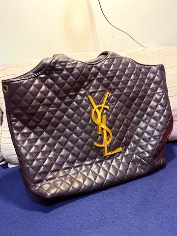 Yves Saint Laurent black clutch bag (pre-owned) — not authentic