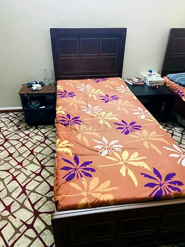 Single wooden bed with headboard and mattress - good condition
