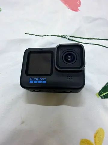 GoPro HERO 11 action camera (used) with lens protector