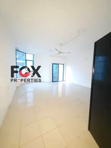 Own one of the most beautiful and spacious two-bedroom apartments in Al Nuaimiya, spanning 1,818 square feet, in a prime location close to all essenti