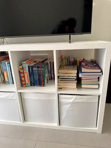 Ikea Kallax shelving unit with boxes