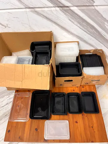 Bulk pack of unused plastic meal prep containers with lids
